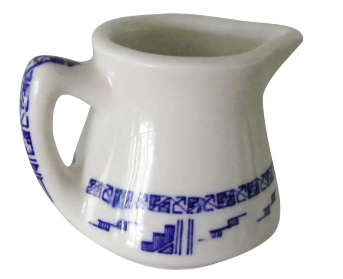 https://www.antiquetrader.com/.image/t_share/MTczMzEzMjE2NDkzOTIxOTA3/creamer4a.png